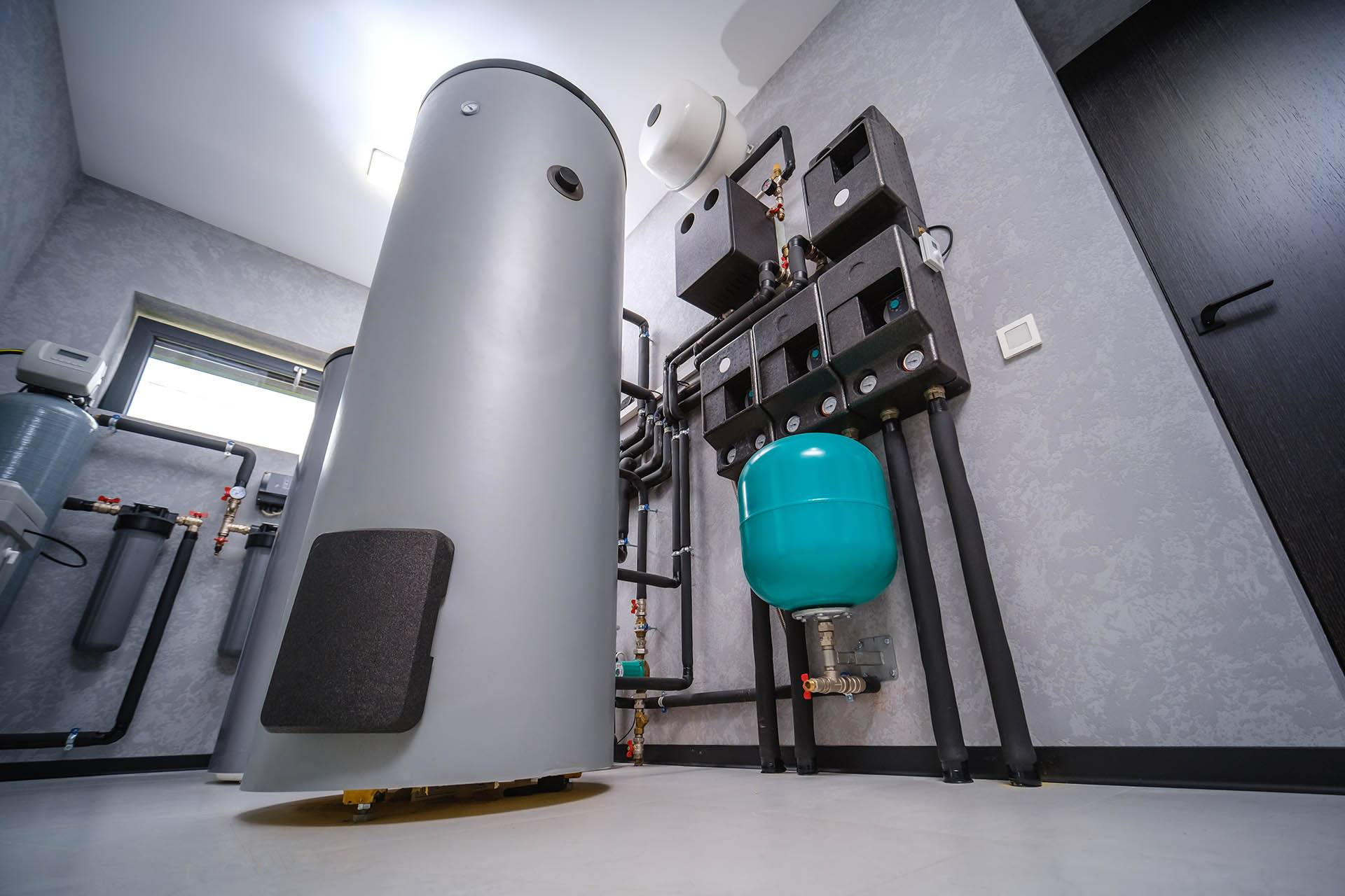 Solar and electric water heaters installed by AquaCore, Centralized electric water heater system